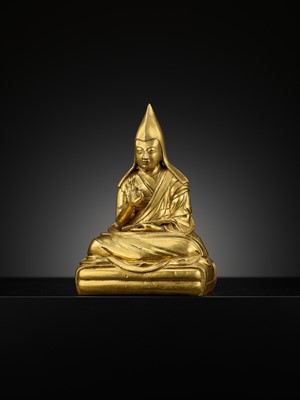 Lot 26 - A GILT-BRONZE FIGURE OF THE SIXTH PANCHEN LAMA, LOBZANG PALDEN YESHE