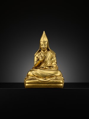 Lot 26 - A GILT-BRONZE FIGURE OF THE SIXTH PANCHEN LAMA, LOBZANG PALDEN YESHE