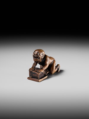 Lot 202 - ISSEKI: AN UNUSUAL WOOD NETSUKE OF A BLIND RAT CATCHER