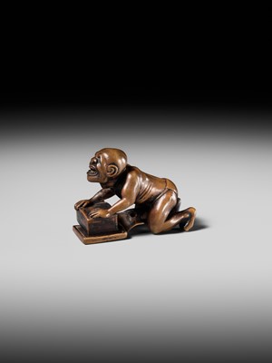 Lot 202 - ISSEKI: AN UNUSUAL WOOD NETSUKE OF A BLIND RAT CATCHER