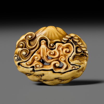 Lot 261 - SAJISAI: AN IVORY RYUSA MANJU NETSUKE OF A DRAGON ASCENDING MOUNT FUJI