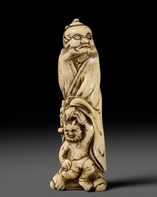 Lot 305 - AN ANTLER NETSUKE OF SHOKI AND ONI