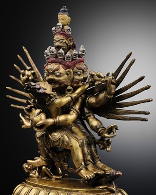 Lot 4 - A GILT-BRONZE FIGURE OF A WINGED HERUKA AND CONSORT, TIBET, 19TH CENTURY