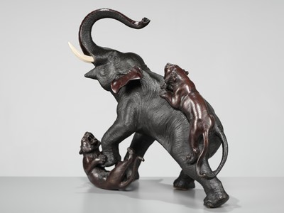 Lot 51 - TSUNEMITSU: A LARGE INLAID BRONZE OKIMONO OF AN ELEPHANT FIGHTING OFF TWO TIGERS