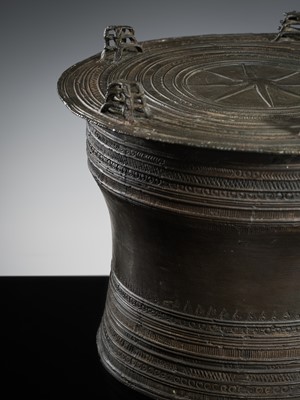 Lot 436 - A SMALL BRONZE RAIN DRUM, KAREN PEOPLE, REGION OF MYANMAR AND THAILAND, 19TH CENTURY OR EARLIER