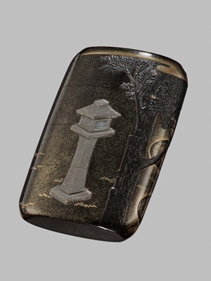 Lot 42 - A FINE BUFFALO HORN-INLAID THREE-CASE INRO OF A DEER AT NIGHT IN KASUGA PARK, NARA