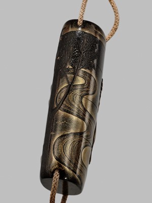 Lot 42 - A FINE BUFFALO HORN-INLAID THREE-CASE INRO OF A DEER AT NIGHT IN KASUGA PARK, NARA