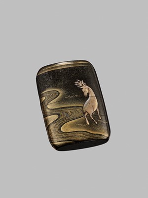 Lot 42 - A FINE BUFFALO HORN-INLAID THREE-CASE INRO OF A DEER AT NIGHT IN KASUGA PARK, NARA