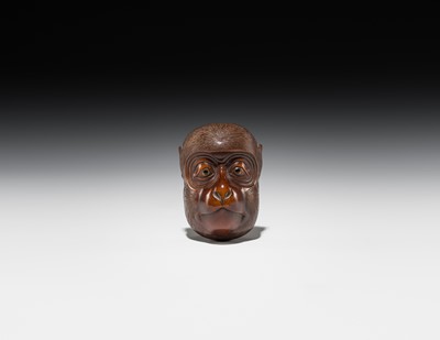 Lot 370 - A SMALL WOOD CARVING OF A KYOGEN MONKEY MASK