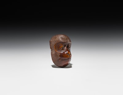 Lot 370 - A SMALL WOOD CARVING OF A KYOGEN MONKEY MASK