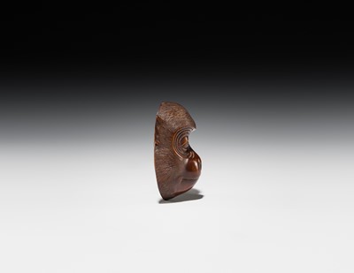 Lot 370 - A SMALL WOOD CARVING OF A KYOGEN MONKEY MASK