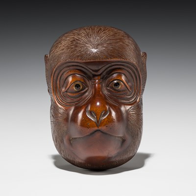 Lot 370 - A SMALL WOOD CARVING OF A KYOGEN MONKEY MASK