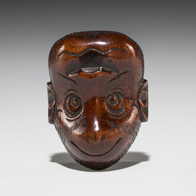 Lot 545 - A WOOD ‘DOUBLE MASK’ NETSUKE OF SARU TYPE