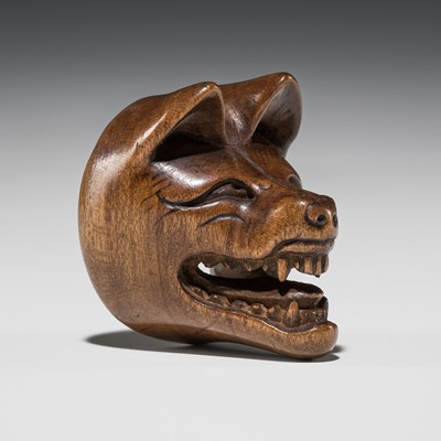 Lot 547 - DEME UMAN: A WOOD KYOGEN MASK NETSUKE OF A KITSUNE (FOX)