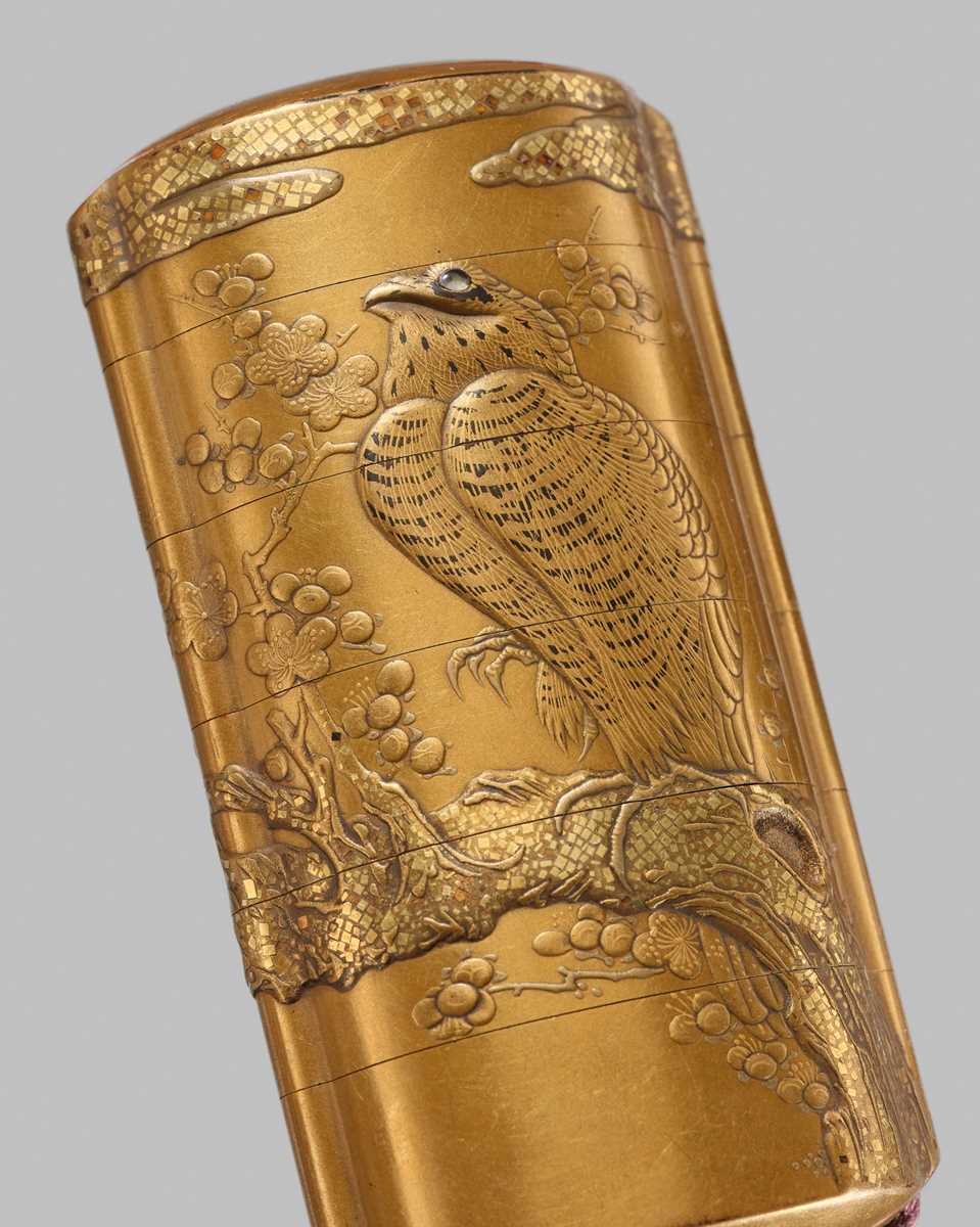KOMA KOKAKUSAI: A SUPERB FIVE-CASE GOLD LACQUER INRO WITH AN EAGLE ON A CHERRY BRANCH