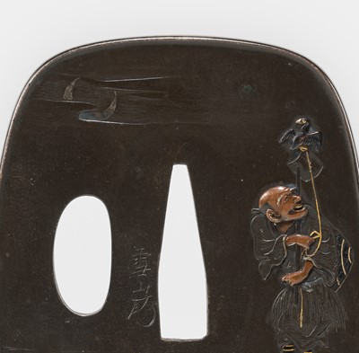 Lot 570 - SETSUSAN: A FINE SHIBUICHI TSUBA OF A CORMORANT FISHERMAN