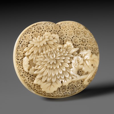 Lot 260 - MASANOBU: A FINE IVORY MANJU NETSUKE WITH CHRYSANTHEMUM