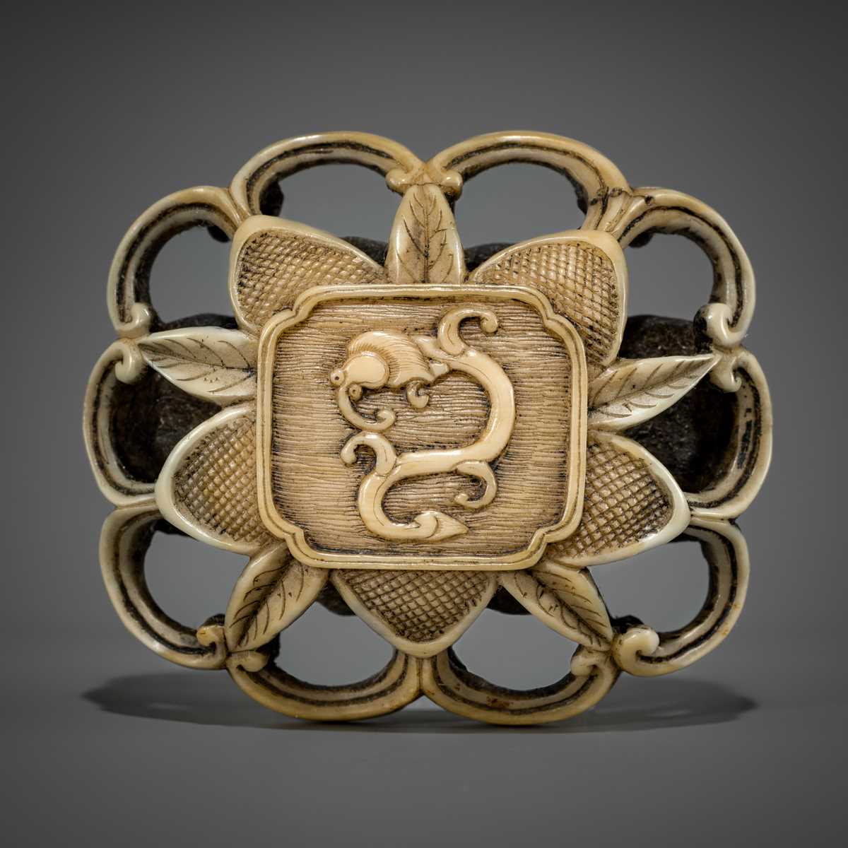 Lot 472 - A FINE WALRUS TUSK RYUSA MANJU NETSUKE OF A WATER DRAGON (AMARYU)