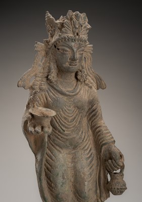 Lot 989 - A KASHMIR-STYLE BRONZE FIGURE OF A FEMALE DEITY