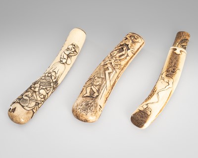 Lot 1462 - A FINE LOT WITH THREE ANTLER KISERUZUTSU (PIPE CASE)