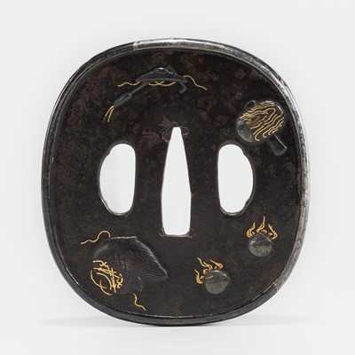 Lot 1570 - AN IRON TSUBA WITH AUSPICIOUS SYMBOLS