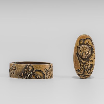 Lot 639 - SHOZUI: A FINE SENTOKU FUCHI AND KASHIRA WITH TIGER AND DRAGON