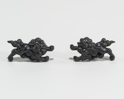 Lot 647 - A FINE PAIR OF SHAKUDO MENUKI DEPICTING SHISHI, WITH NBTHK HOZON CERTIFICATE