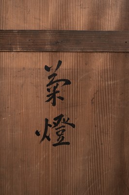 Lot 135 - A LARGE PAIR OF BLACK LACQUERED CANDLESTICKS