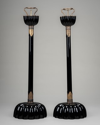 Lot 135 - A LARGE PAIR OF BLACK LACQUERED CANDLESTICKS