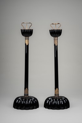 Lot 135 - A LARGE PAIR OF BLACK LACQUERED CANDLESTICKS