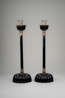 Lot 135 - A LARGE PAIR OF BLACK LACQUERED CANDLESTICKS