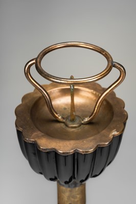 Lot 135 - A LARGE PAIR OF BLACK LACQUERED CANDLESTICKS