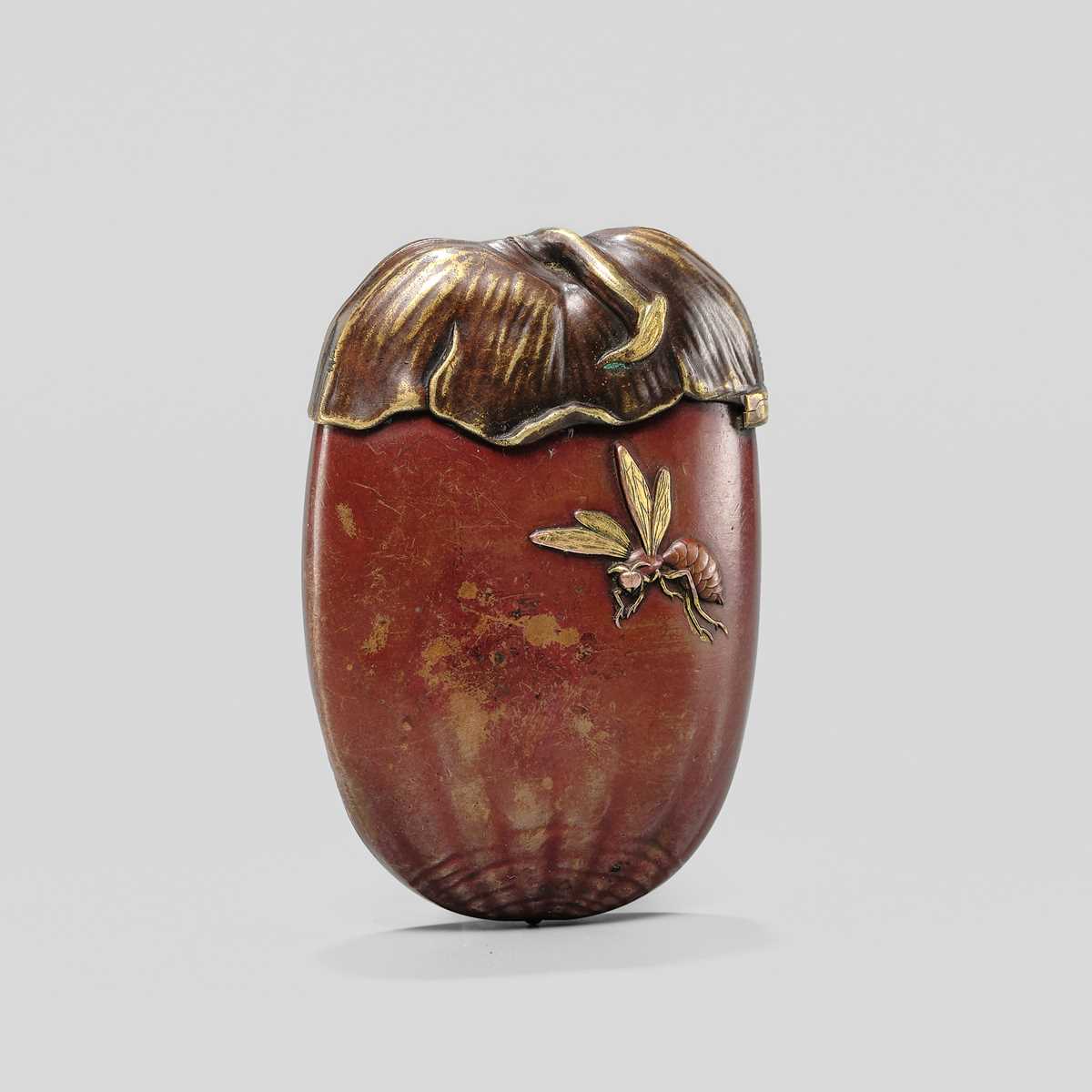 Lot 13 - A FINE MIXED-METAL CHESTNUT-FORM MATCHCASE