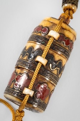 Lot 1441 - AN ENAMELED MINIATURE TWO-CASE ANTLER INRO WITH NETSUKE AND OJIME
