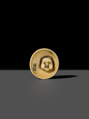 Lot 143 - MITSUHIRO: AN IVORY NETSUKE OF AN OKAME MASK INSIDE AN EARTHENWARE BOWL, DATED 1840