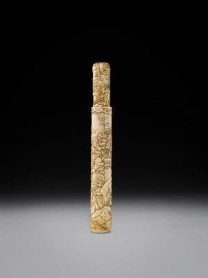 Lot 54 - A FINE IVORY KISERUZUTSU WITH THE SEVEN LUCKY GODS (SHICHIFUKUJIN)