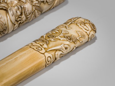 Lot 54 - A FINE IVORY KISERUZUTSU WITH THE SEVEN LUCKY GODS (SHICHIFUKUJIN)