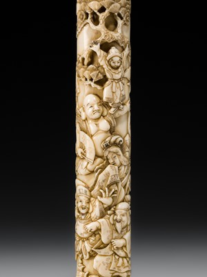 Lot 54 - A FINE IVORY KISERUZUTSU WITH THE SEVEN LUCKY GODS (SHICHIFUKUJIN)