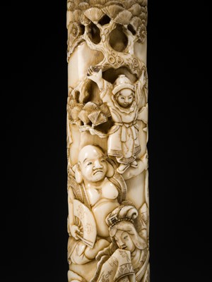 Lot 54 - A FINE IVORY KISERUZUTSU WITH THE SEVEN LUCKY GODS (SHICHIFUKUJIN)