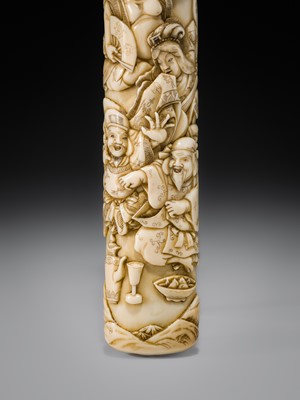 Lot 54 - A FINE IVORY KISERUZUTSU WITH THE SEVEN LUCKY GODS (SHICHIFUKUJIN)