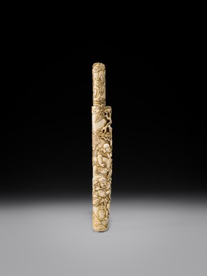 Lot 54 - A FINE IVORY KISERUZUTSU WITH THE SEVEN LUCKY GODS (SHICHIFUKUJIN)