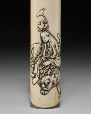 Lot 57 - TOSHIYUKI: A FINE IVORY KISERUZUTSU (PIPE CASE) WITH A BODHISATTVA RIDING A TIGER