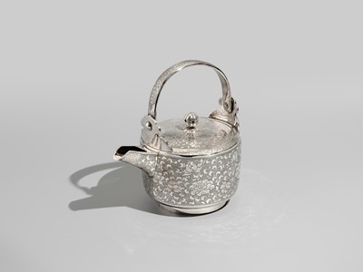 Lot 29 - A FINE AND LARGE SILVER SAKE EWER WITH PEONY FLOWERS