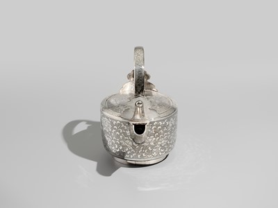 Lot 29 - A FINE AND LARGE SILVER SAKE EWER WITH PEONY FLOWERS