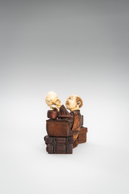 Lot 309 - A LOT WITH TWO TOKYO SCHOOL INLAID WOOD OKIMONO OF SELLERS