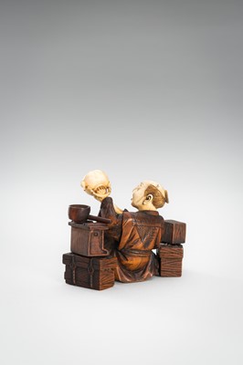 Lot 309 - A LOT WITH TWO TOKYO SCHOOL INLAID WOOD OKIMONO OF SELLERS