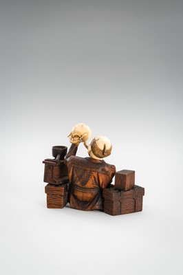 Lot 309 - A LOT WITH TWO TOKYO SCHOOL INLAID WOOD OKIMONO OF SELLERS