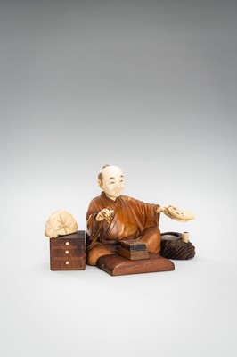 Lot 309 - A LOT WITH TWO TOKYO SCHOOL INLAID WOOD OKIMONO OF SELLERS