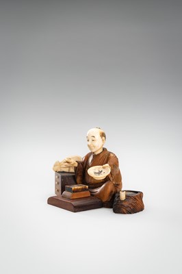 Lot 309 - A LOT WITH TWO TOKYO SCHOOL INLAID WOOD OKIMONO OF SELLERS