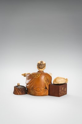 Lot 309 - A LOT WITH TWO TOKYO SCHOOL INLAID WOOD OKIMONO OF SELLERS